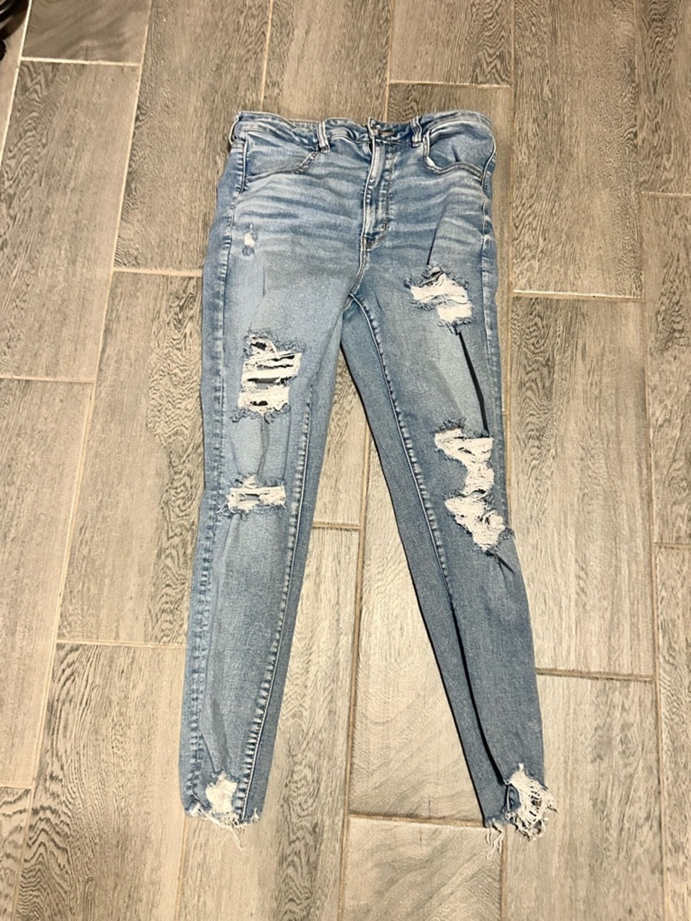 American Eagle Distressed Light Blue jeggings  - super High Rise -size 12